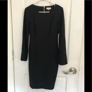 Black Calvin Klein dress with open bell sleeves